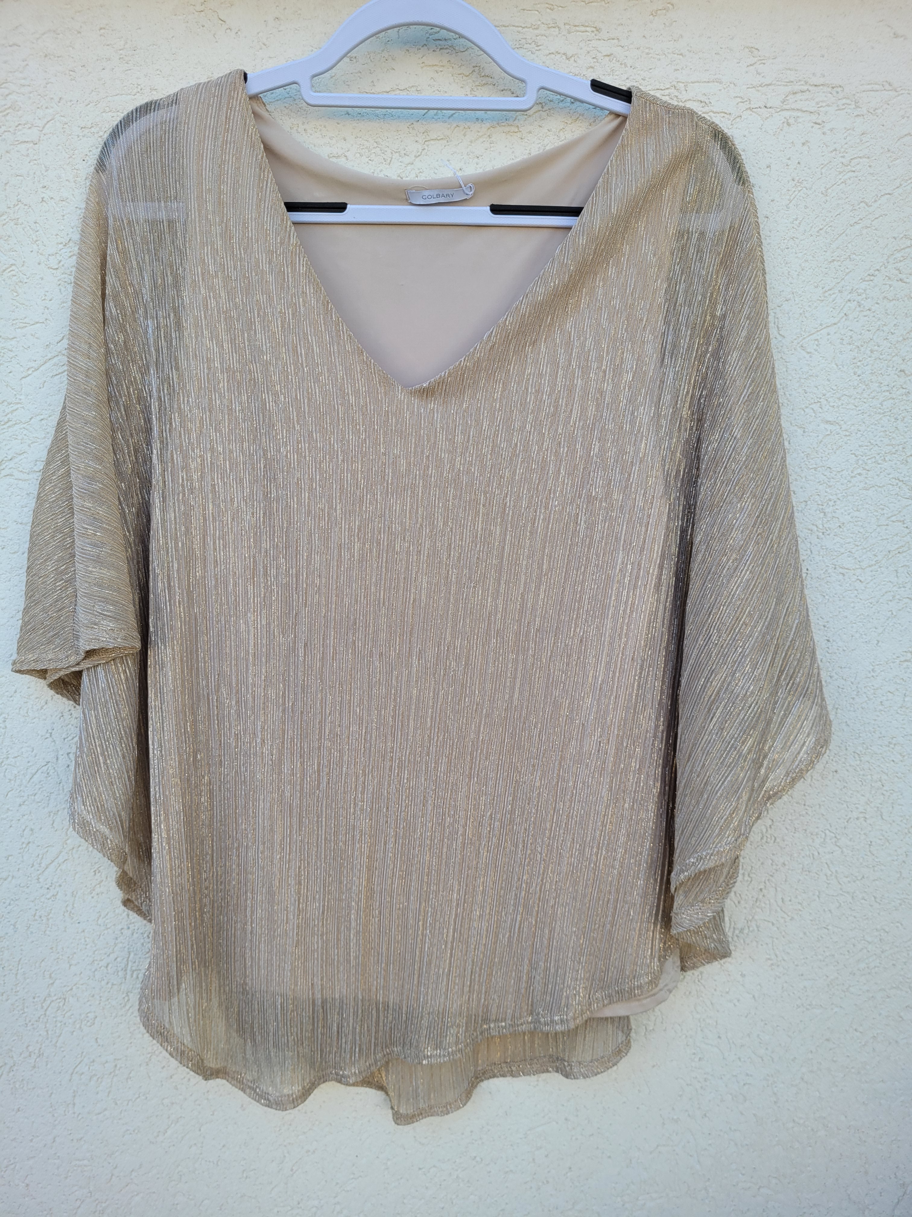 חולצת ערב מוזהבת עם נצנצים