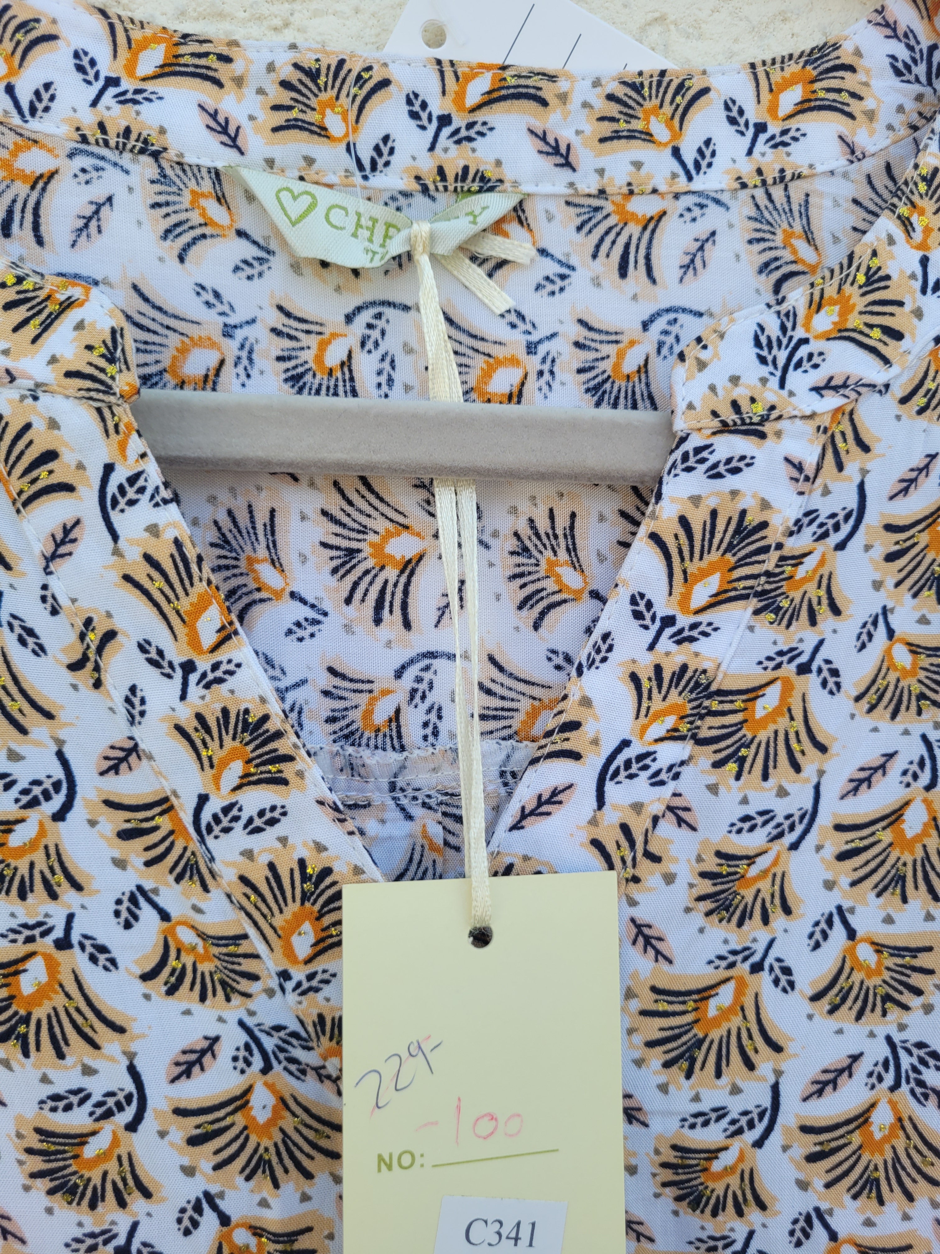 חולצה בהדפס עדין