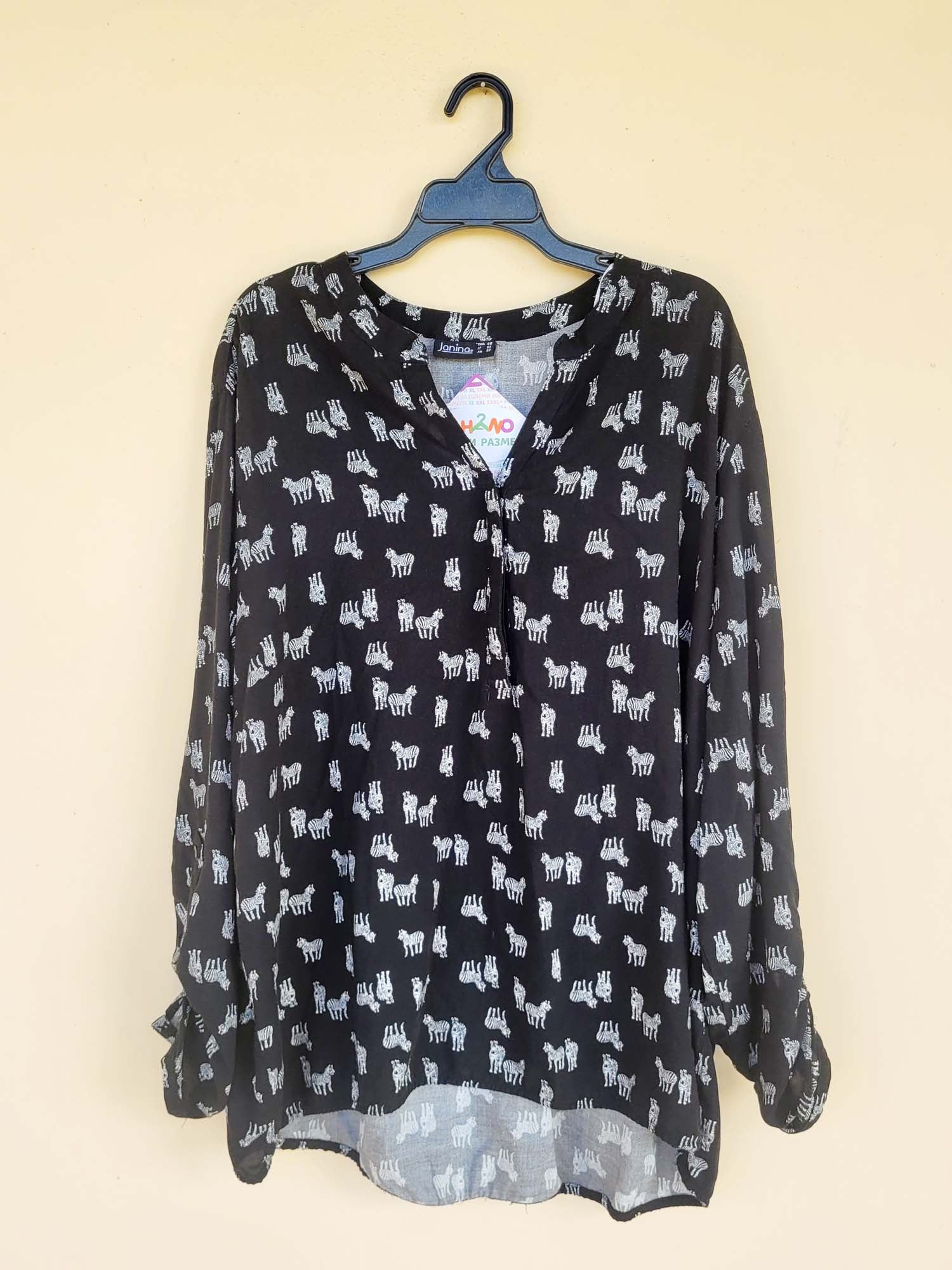 חולצה מכופתרת זברות