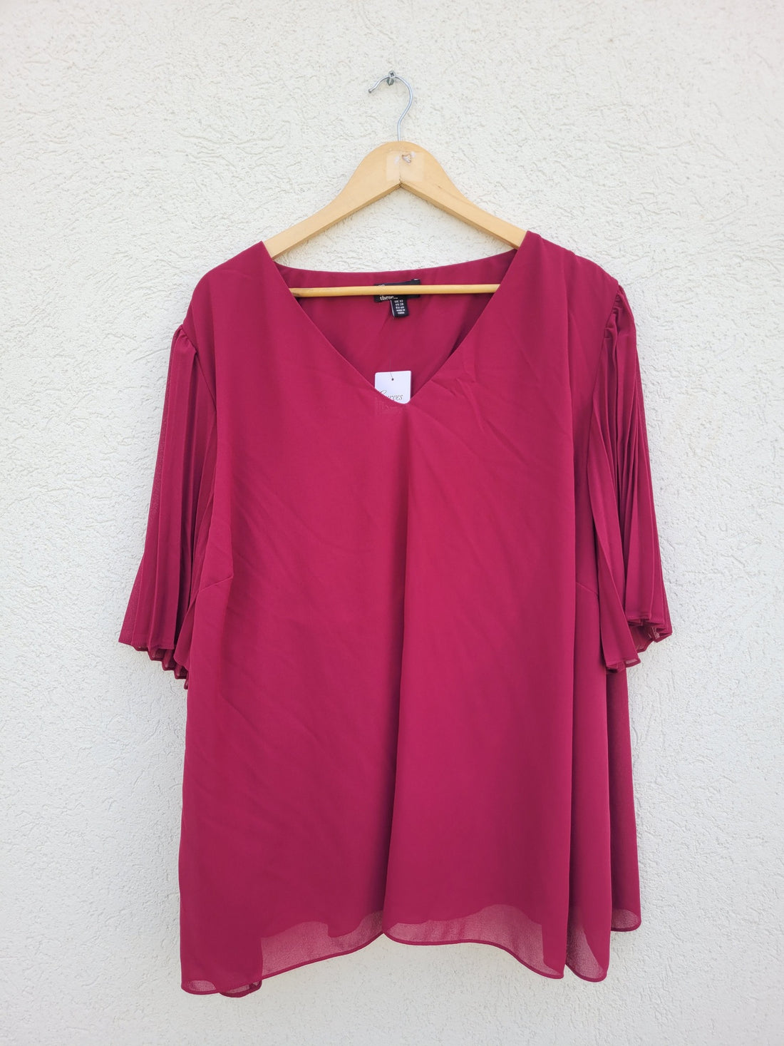 חולצה בורדו עם שרוולי פליסה