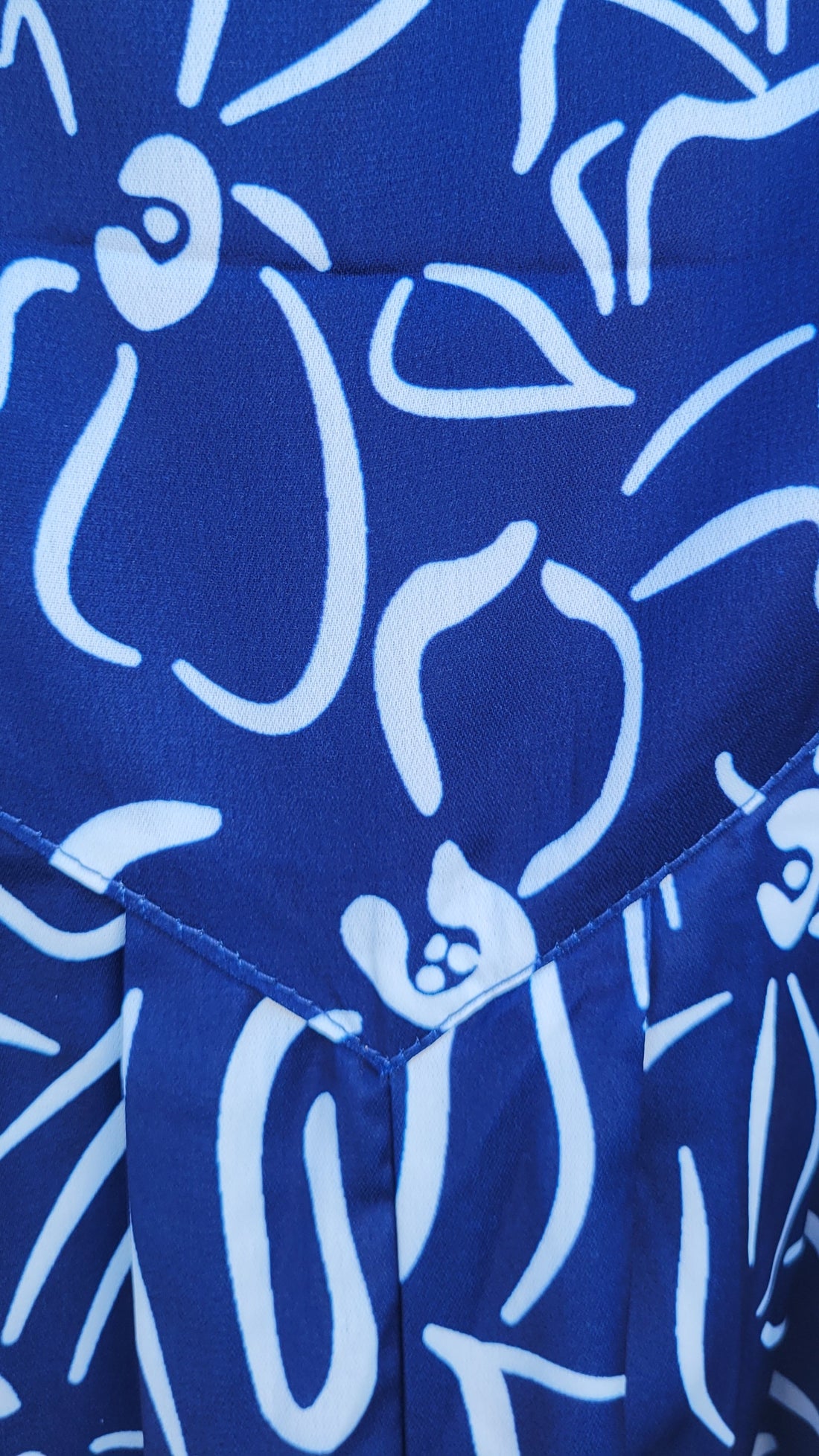 אוברול כחול ולבן