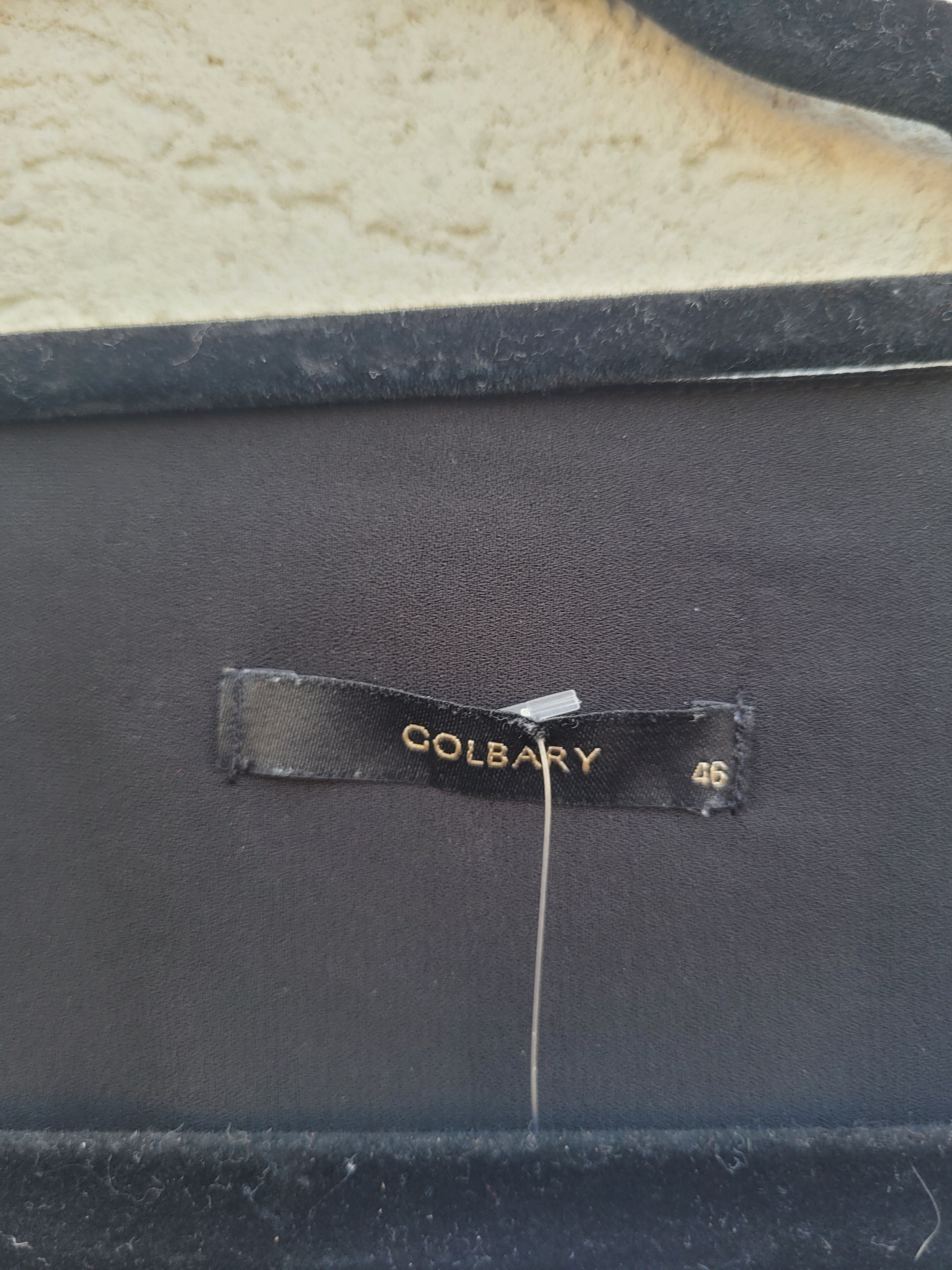 חולצה שחורה עם תחרה לבנה