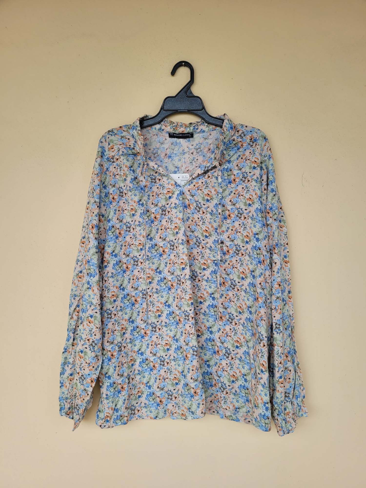 חולצה מכופתרת פרחונית