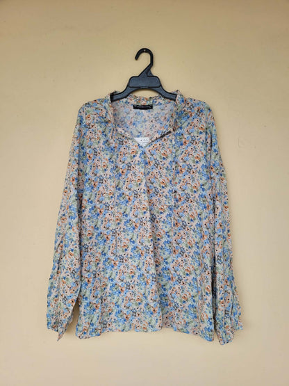 חולצה מכופתרת פרחונית