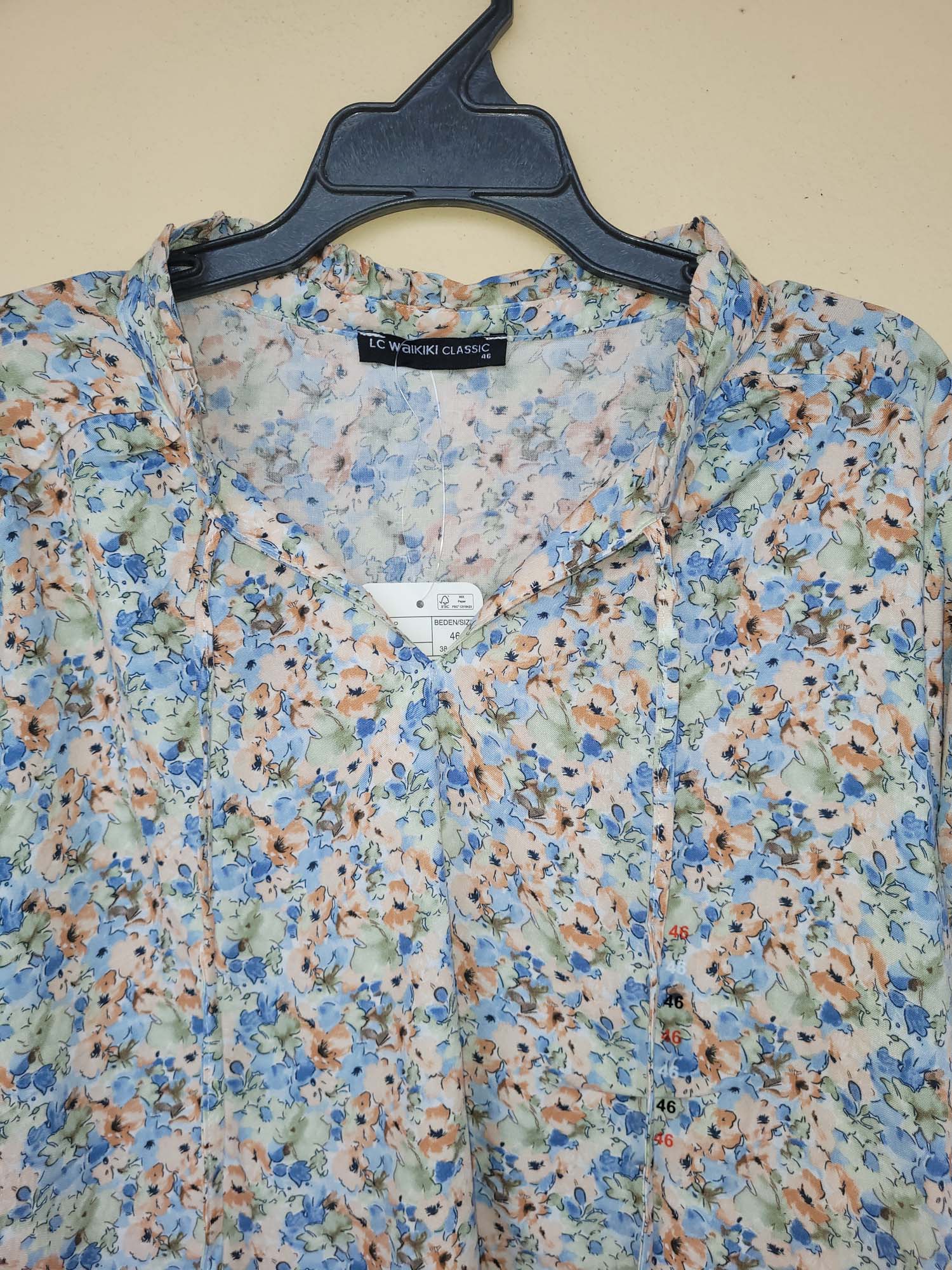 חולצה מכופתרת פרחונית