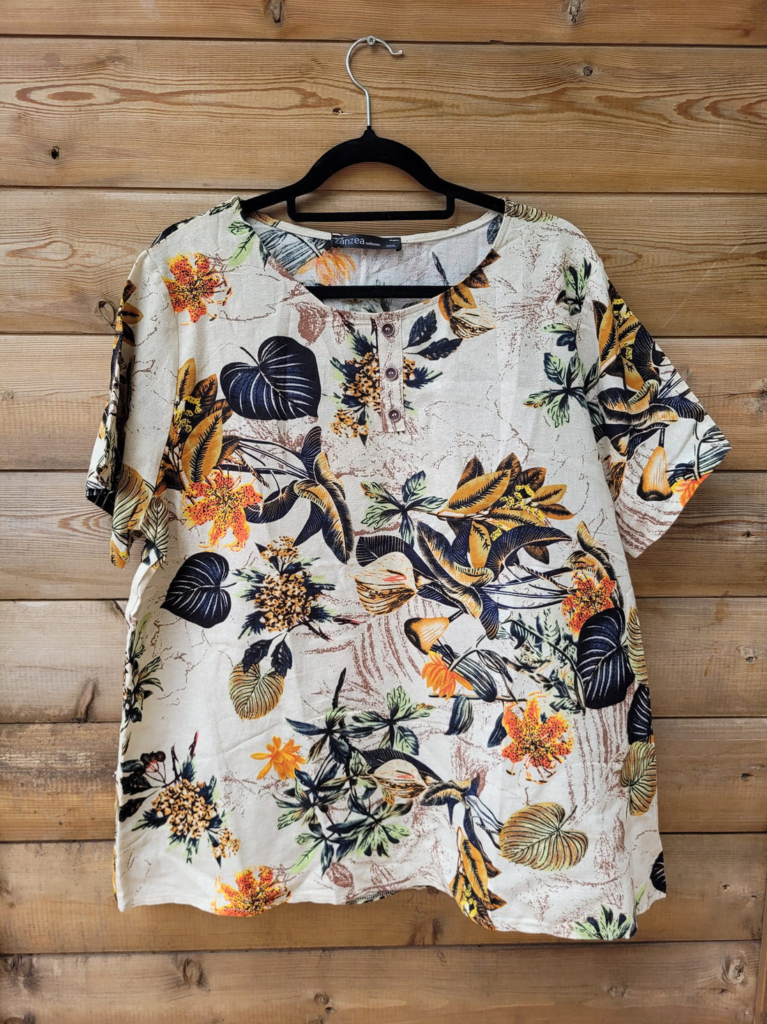 חולצת כותנה עם הדפס עלים ופרחים