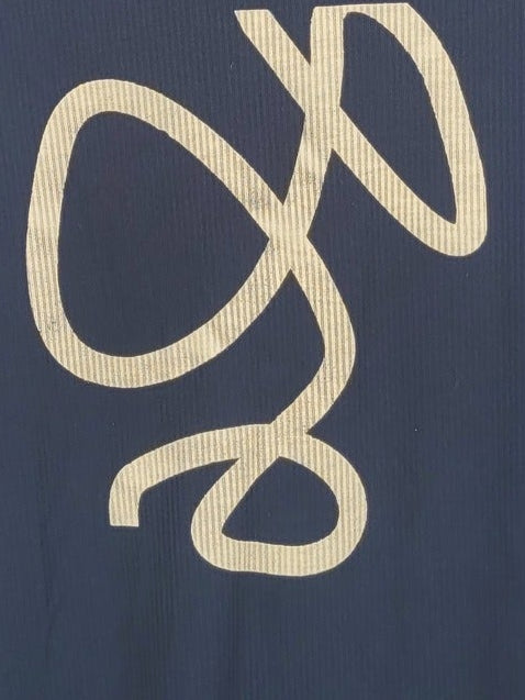 חולצת ריב שחורה עם הדפס מוזהב