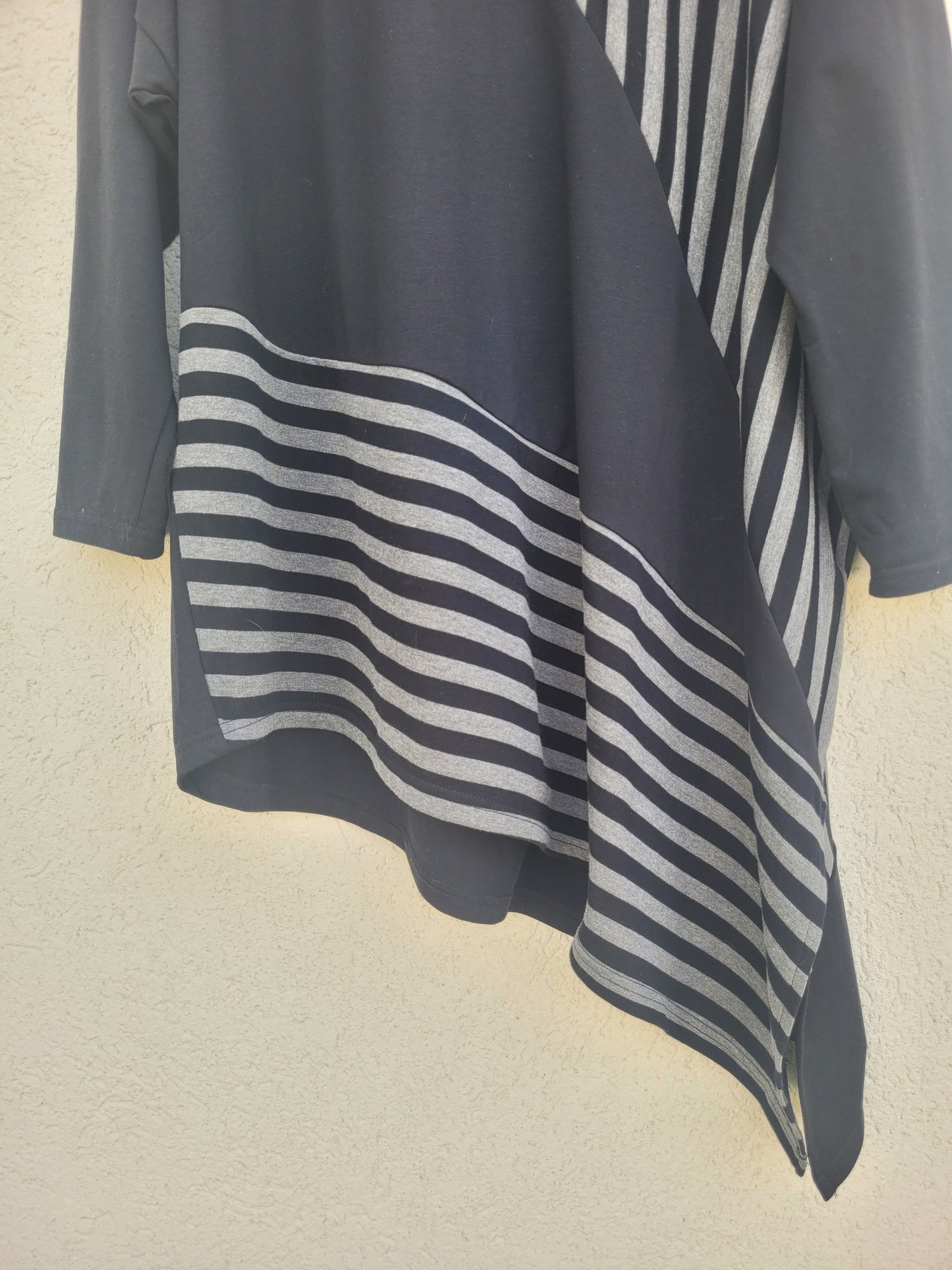 טוניקה אוברסייזית אסימטרית