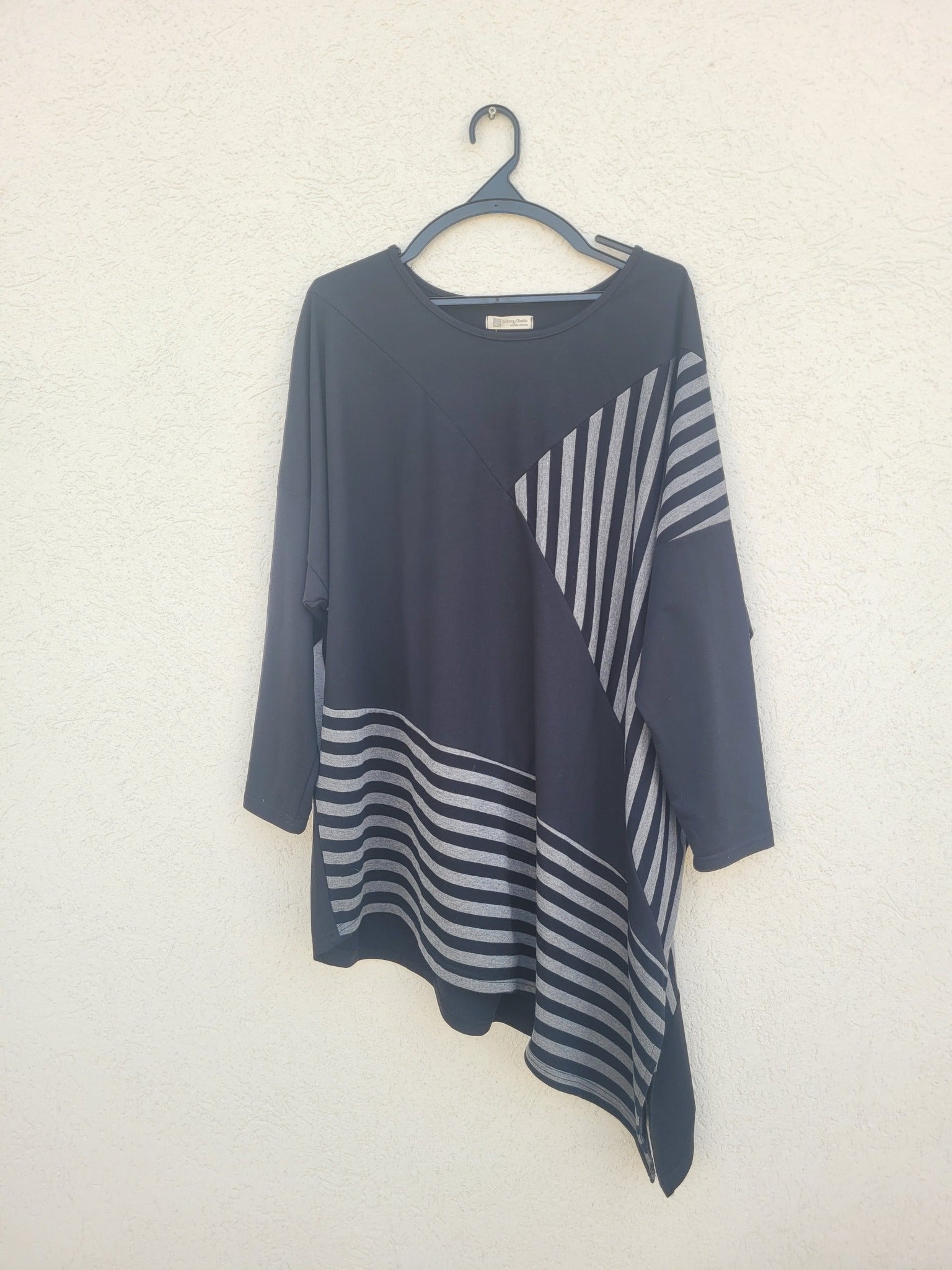 טוניקה אוברסייזית אסימטרית