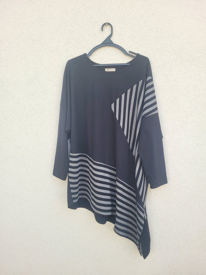 טוניקה אוברסייזית אסימטרית