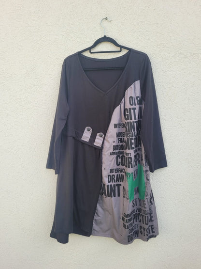 שמלה בהדפס עיתון