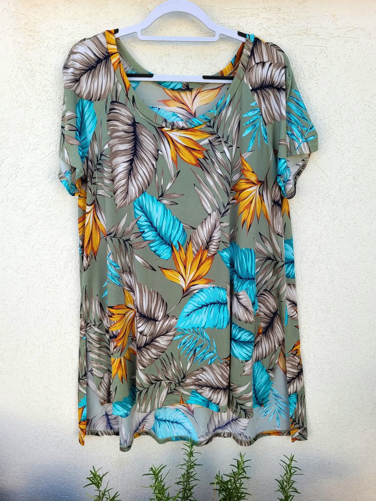 טוניקה בהדפס נוצות